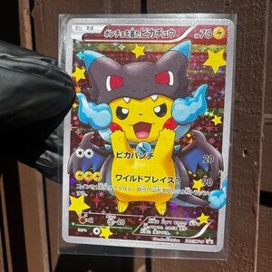 Poncho Wearing Pikachu Charizard X
Japanese Full Art Promo 207/XY-P Pokemon
EX
